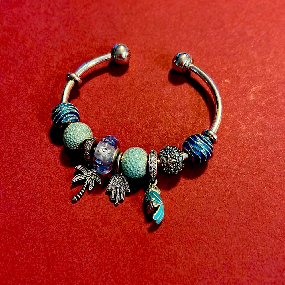 Blue Themed Pandora Bangle Bracelet with 9 charms.